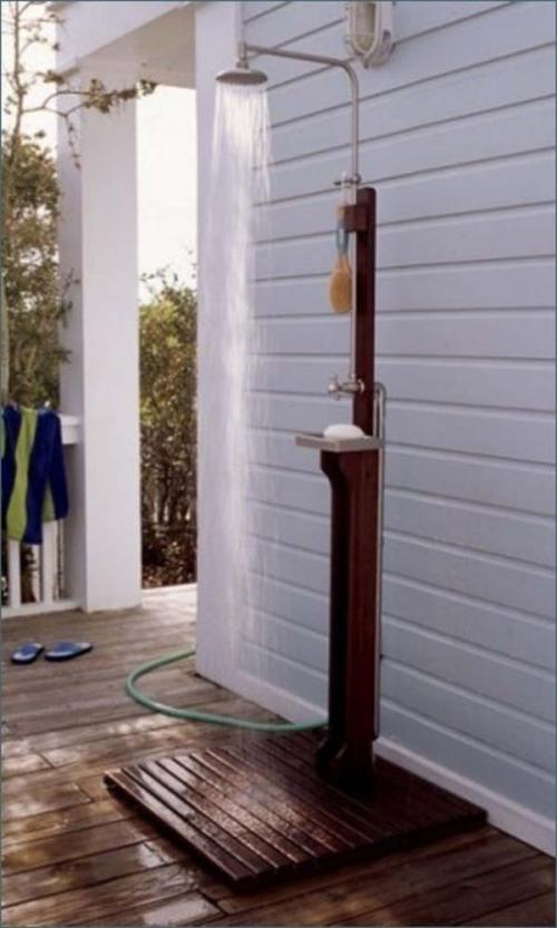 32.) Simple outdoor showers are perfect for beach houses and families who love going outdoors.