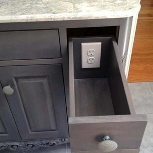 1.) Add outlets to drawers to keep clutter off of the table top.