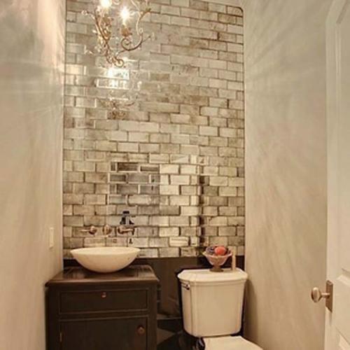 31.) Add mirrored tiles to windowless rooms.