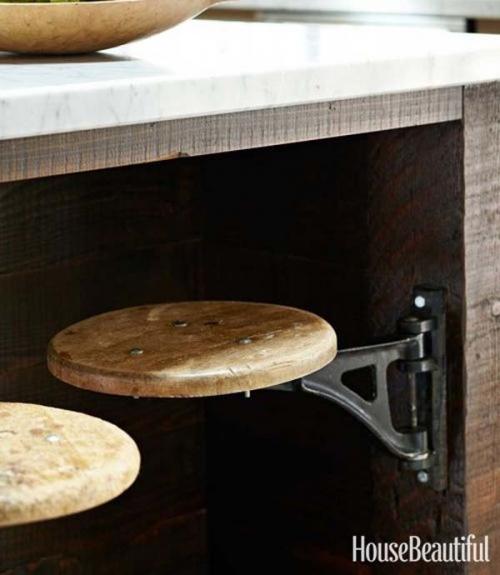 29.) Stools on hinges save room in the kitchen.