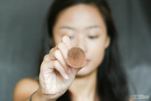 Set the concealer with setting powder. Choose a loose (mineral) powder and dab it on the concealed parts of your face with a stippling brush